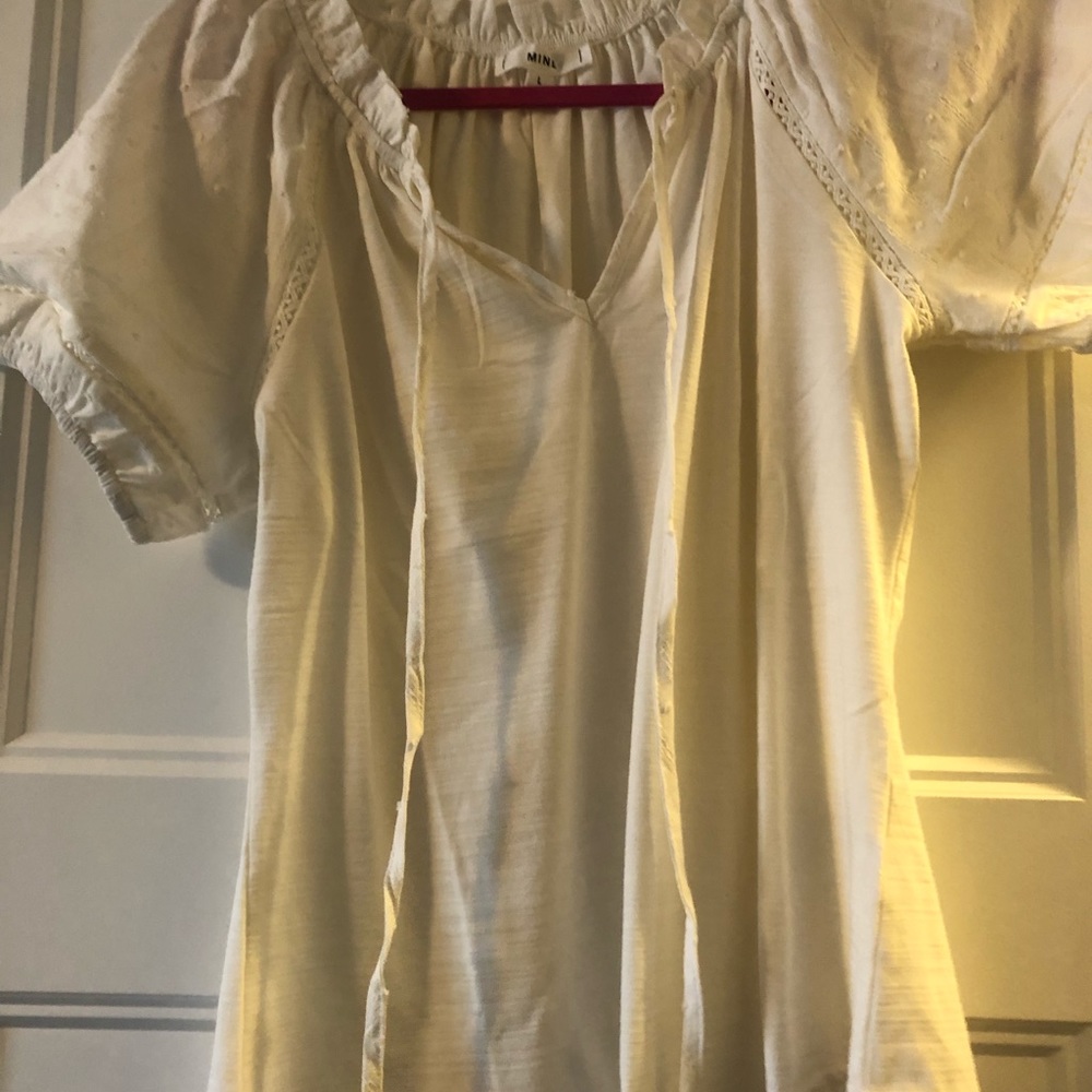 Womens blouse; never worn; tight fitting; true medium